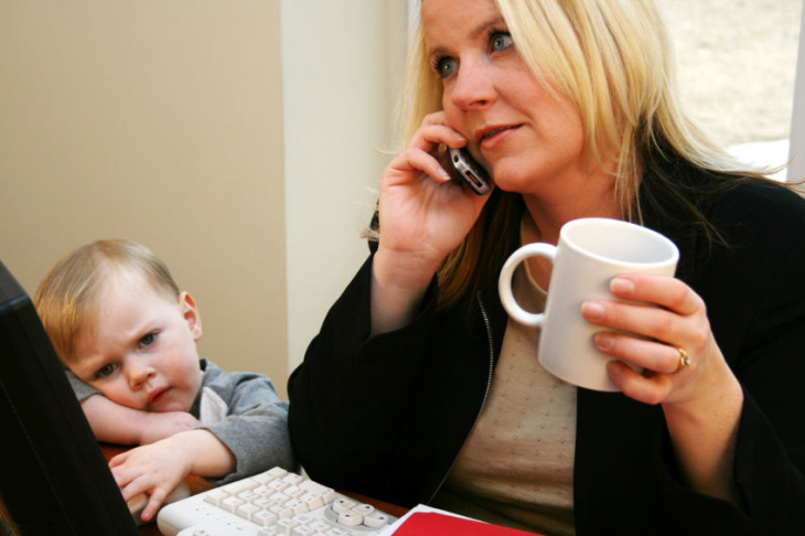 Young Son With His Career-Minded Mother