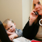 Young Son With His Career-Minded Mother