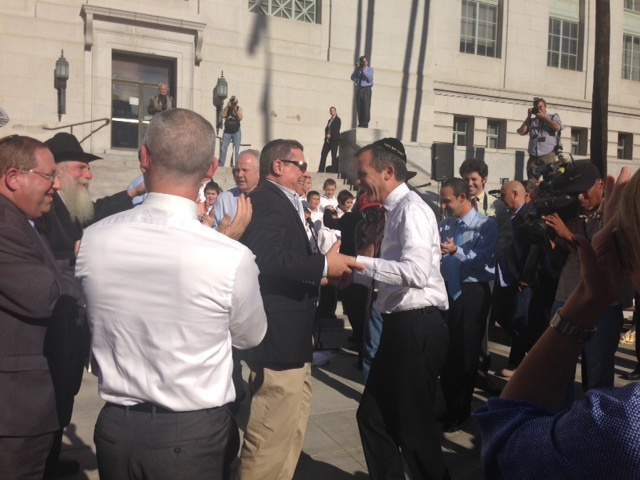 Mayor Eric Garcetti celebrates Hanukkah with Eric Bauman of the Los Angeles County Democratic Party.