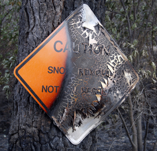 A charred caution sign just outside of California's Yosemite National Park.