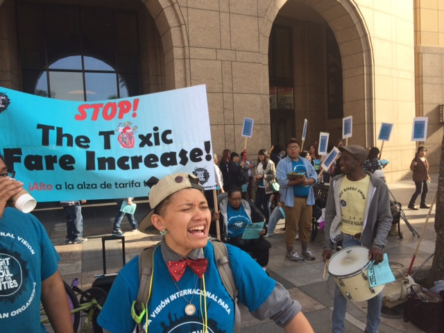 Protestors sang, chanted and marched in front of Metro headquarters Saturday March 29, 2014, before a public meeting about the proposed bus and rail fare increase.