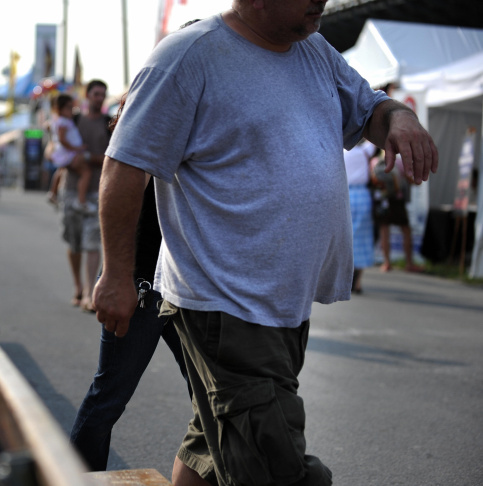 An overweight man walks at the 61st Mont