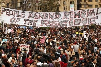 Protestors gather in Tahrir Square on February 1, 2011 in Cairo, Egypt. Protests in Egypt continued with the largest gathering yet, with many tens of thousands assembling in central Cairo, demanding the ouster of Egyptian President Hosni Mubarak. The Egyptian army has said it will not fire on protesters as they gather in large numbers in central Cairo.