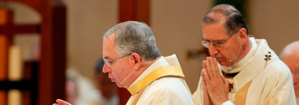 Archbishop Jose H. Gomez (C) and Cardinal Roger Mahony (R) take part in a welcoming Mass at the Cathedral of Our Lady of the Angels May 26, 2010 in downtown Los Angeles, California.