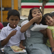 Mexican children eat portions of a 50-me
