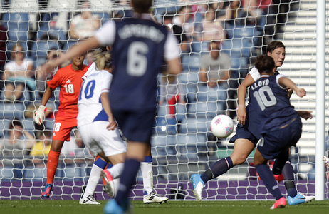 Carli Lloyd scores the U.S. team's winning goal, in a comeback win over France. The Americans are bidding for their third straight Olympic gold medal.