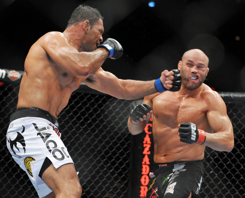 UFC fighter Antonio Nogueira (L) battles UFC fighter Randy Couture (R) during their Heavyweight bout at UFC 102: Couture vs. Nogueira at the Rose Garden Arena on August 29, 2009 in Portland, Oregon.