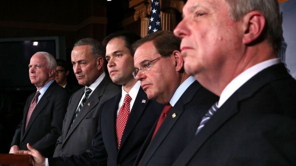 Sen. Charles Schumer, D-N.Y. and Sen. Marco Rubio, R-Fla., (second and third from left) announced plans to work on a bipartisan immigration proposal with their colleagues on Jan. 28 on Capitol Hill. They were also some of the first to respond to a leaked