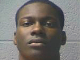 This image provided by the Orangeburg-Calhoun Regional Detention Center shows Justin Bernard Singleton, 19, of Charleston, who is charged with murder in the death of university student Brandon Robinson.