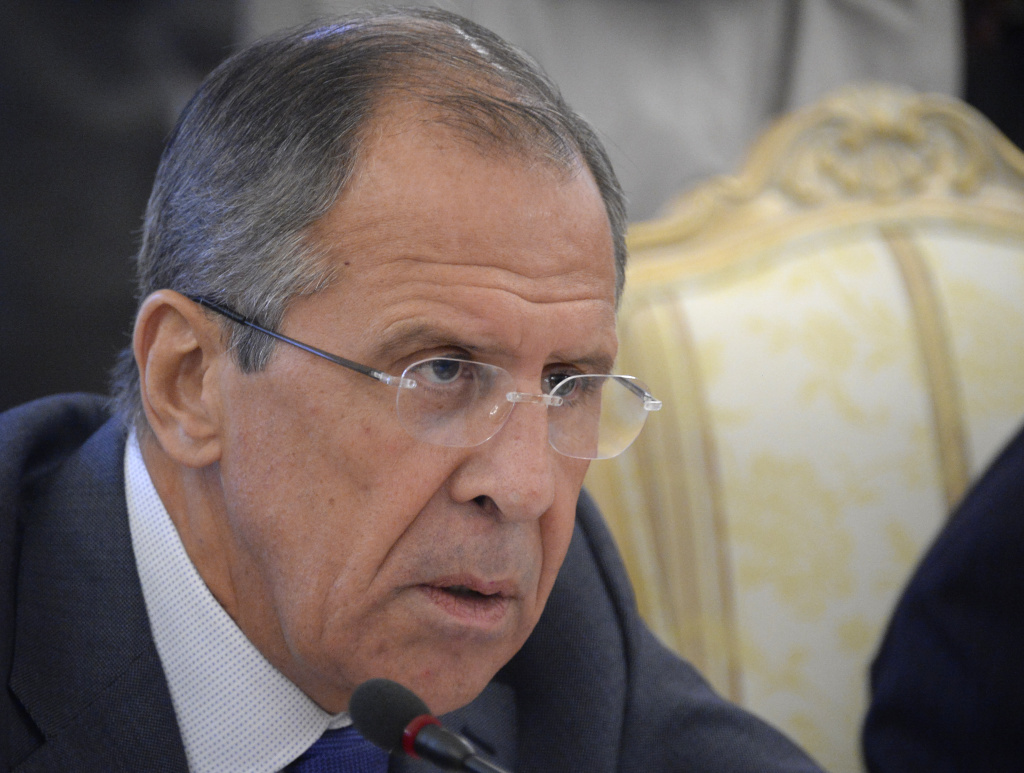 Russia's Foreign Minister Sergei Lavrov (R) speaks with his French counterpart Laurent Fabius during their meeting in Moscow, on September 17, 2013. Lavrov said Wednesday that Russia intends to show evidence to the U.N. Security Council that rebels carried out a chemical weapons attack on Aug. 21.