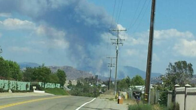 Clouds from a brush fire east of Temecula is seen on Tuesday.