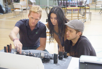 Director Neil Patrick Harris with Vanessa Hudgens as Mimi and Aaron Tveit as Roger in rehearsal for "RENT" at the Hollywood Bowl August 6-8.