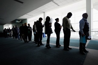Job seekers line up to enter Choice Career Fair at the Los Angeles Convention Center on December 1, 2010.