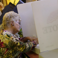 A voter fills out her ballot during early voting before the 2012 presidential election at the Gila County Recorder's Office in Globe, Ariz., on Oct. 26.