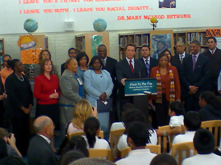 California Governor Arnold Schwarzenegger talks on Thursday, Jan. 7, 2010 to eighth graders during the signing of education reform measure 'Race to the Top' at Mary McLeod Bethune Middle School in South Los Angeles.