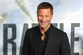 Actor Aaron Eckhart arrives at the premiere of 'Battle : Los Angeles' in Westwood, California on March 8, 2011.