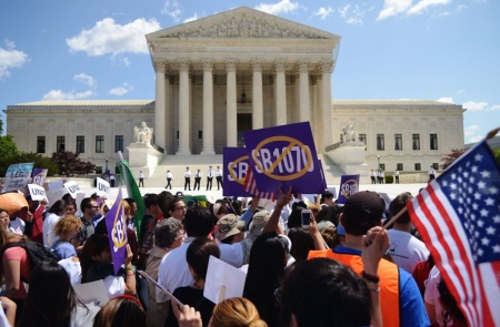 Protesters should slogans during a prote