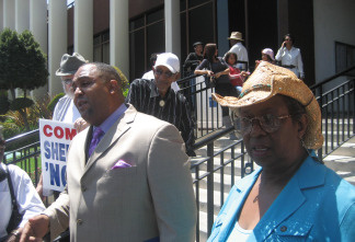 Activists Joyce Kelly and William Kemp on steps of Compton City Hall, August 12, 2010.