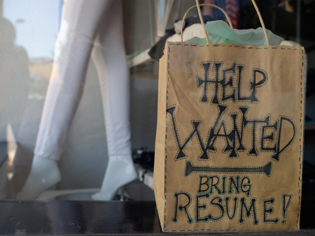 A "help wanted" sign earlier this year in the window of a clothing store in Pasadena, Calif.