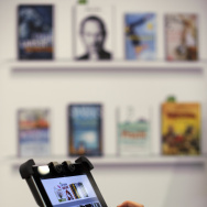 A fair goer tries out Deutsche Telekom's