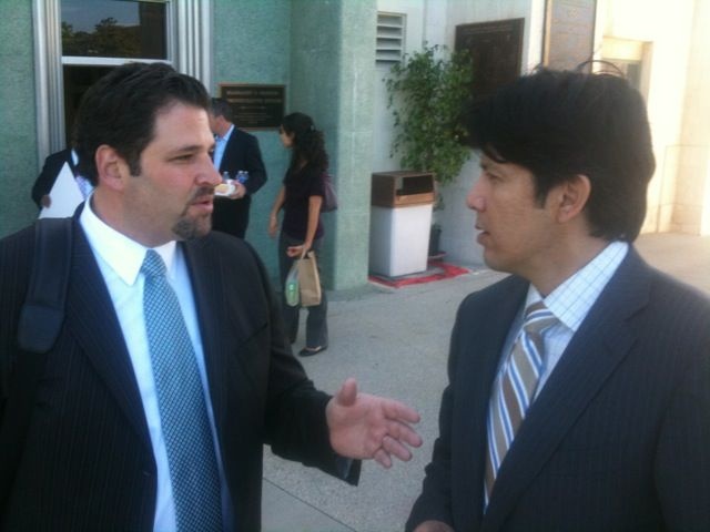 Former sports agent Josh Luchs, left, with State Senator Kevin de León