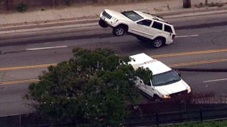 suv caught in downed power line