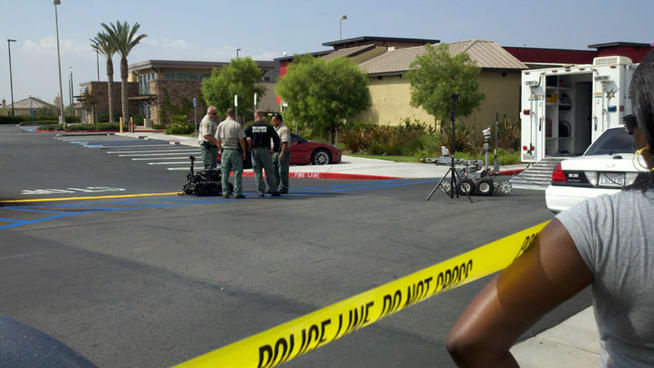 A robot is brought in by authorities after a potential explosive device was left following a Moreno Valley bank robbery.