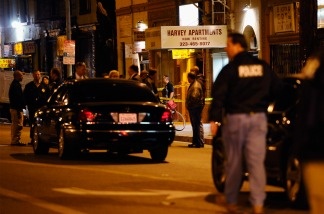 Los Angeles Police Department officers and Beverly Hills Police Department detectives stand outside the Harvey Apartments on Dec. 1, 2010 in Los Angeles where a suspect in the murder of Ronni Chasen fatally shot himself. Police now say the gun the man used to shoot himself is the same gun used to kill Chasen.