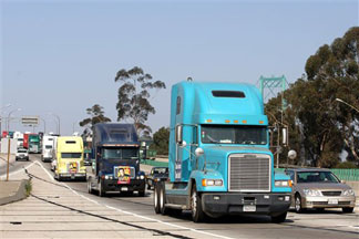Truck drivers headed to the Port of Long Beach in support of the "Clean Trucks Program" in 2007. The program requires diesel trucks at the Ports to meet federal clean truck emissions standards and has reduced air pollution.