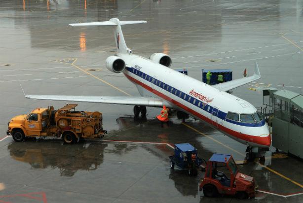 TORONTO, ON - NOVEMBER 29: An American Airline Plan sits on teh tarmac at Toronto Pearson Airport on November 29, 2011 in Toronto, Canada. American Airlines and its parent company AMR filed for Chapter 11 bankruptcy November 29, reportedly in an effort to shed debt and reduce labor costs.