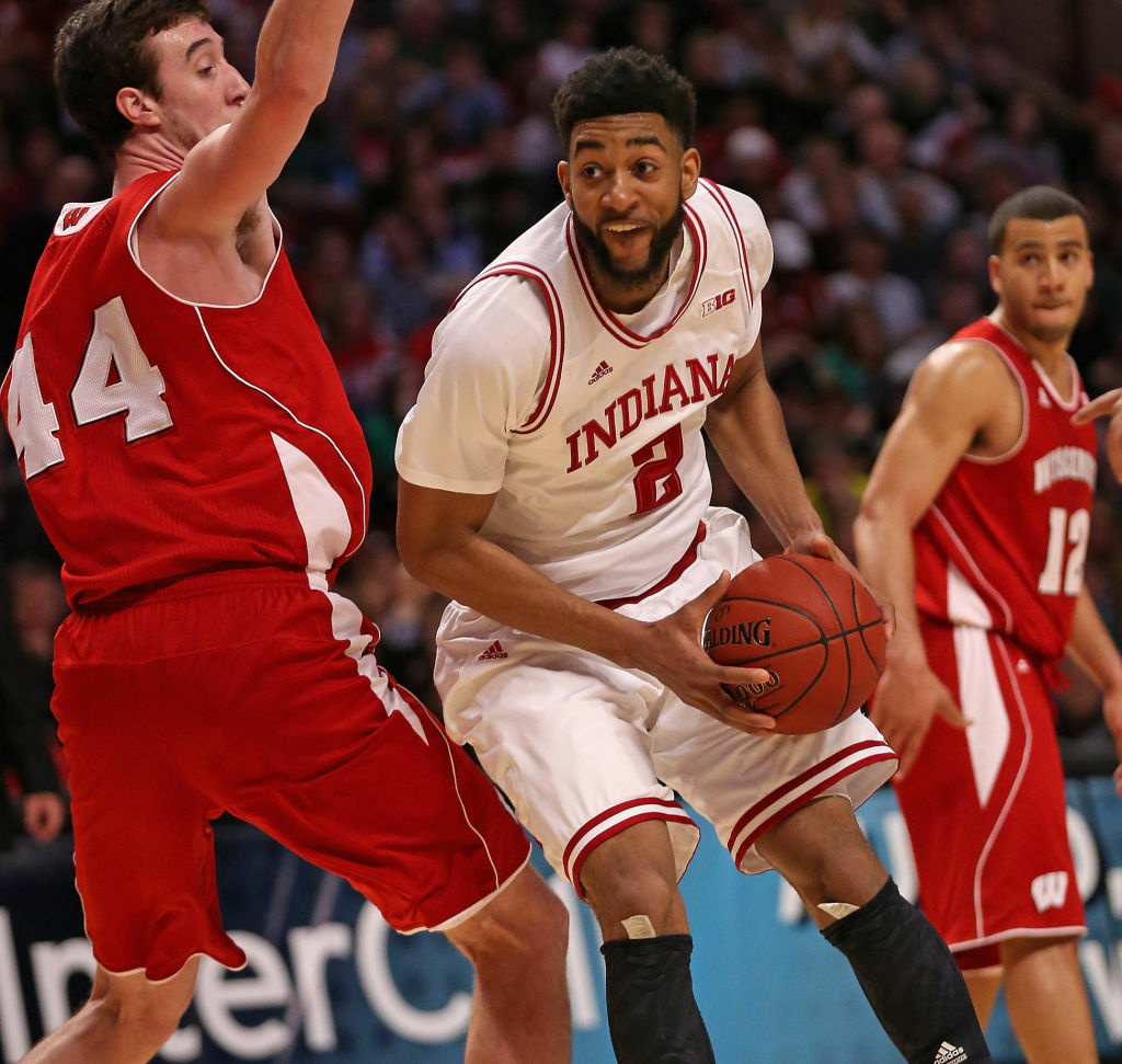 Christian Watford of the Indiana Hoosiers moves against Frank Kaminsky of the Wisconsin Badgers during a semifinal game of the Big Ten Basketball Tournament at the United Center on March 16, 2013.
