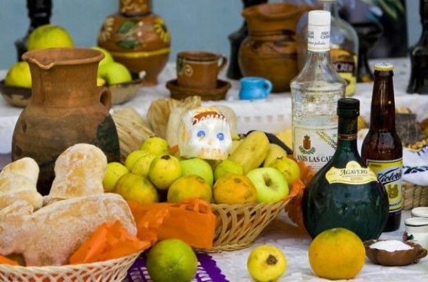 Ofrendas of food and beverages on an altar in Mexico City in preparation for Day of the Dead, October 31, 2008