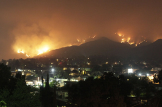 California wildfires light the hillsides of the Tujunga area of Los Angeles on Monday, Aug. 31, 2009.