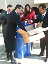 LA Mayor Antonio Villaraigosa and Council President Eric Garcetti demonstrate LA's wide-ranging capacity to recycle lots of different substances. The mayor says he wants a 70% recycling rate within 4 years.