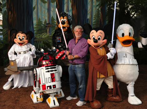 George Lucas Poses With A Group Of "Star Wars" Inspired Disney Characters At Disney's Hollywood Studios