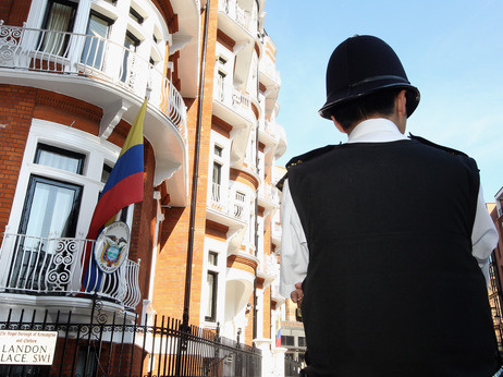 A British police officer stood outside the Ecuadorian consulate in London June 20, 2012, as WikiLeaks founder Julian Assange remained inside.
