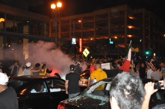 Laker fans start a fire in the intersection of 9th and Hope in Downtown Los Angeles after a Laker victory in Game 7 of the NBA Finals on June 17, 2010