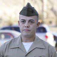 Staff Sgt. Frank Wuterich walks into cou
