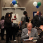 Job Seekers Look For Employment Opportunities At Career Fair