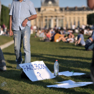 A paper sheet shows the word "facebook"