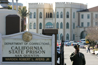 A guard stands at the entrance to the California State Prison at San Quentin in San Quentin, California.