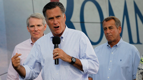 Republican presidential candidate Mitt Romney campaigns with Sen. Rob Portman of Ohio (left) and House Speaker John Boehner on Sunday, June 17 2012 in Troy, Ohio.