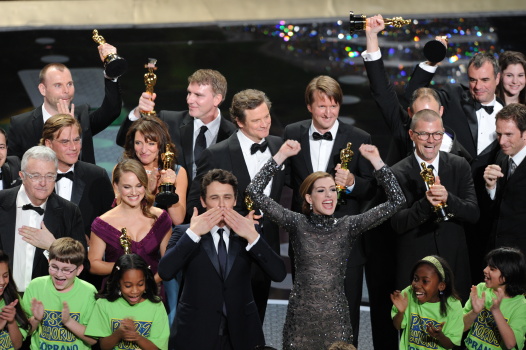 Presenters Anne Hathaway (C, R) and Jame