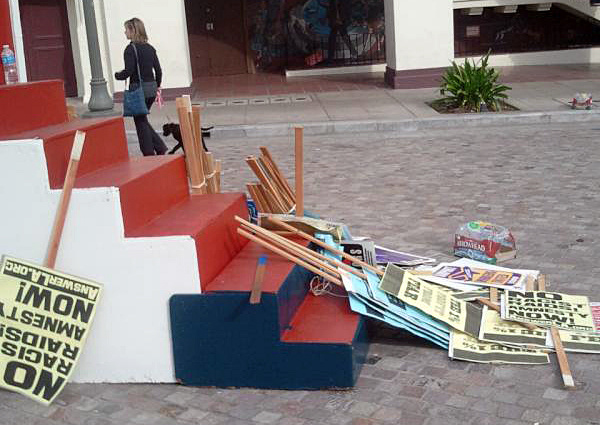 Leftover signs as immigration protesters move out in downtown L.A. for a rally last December.