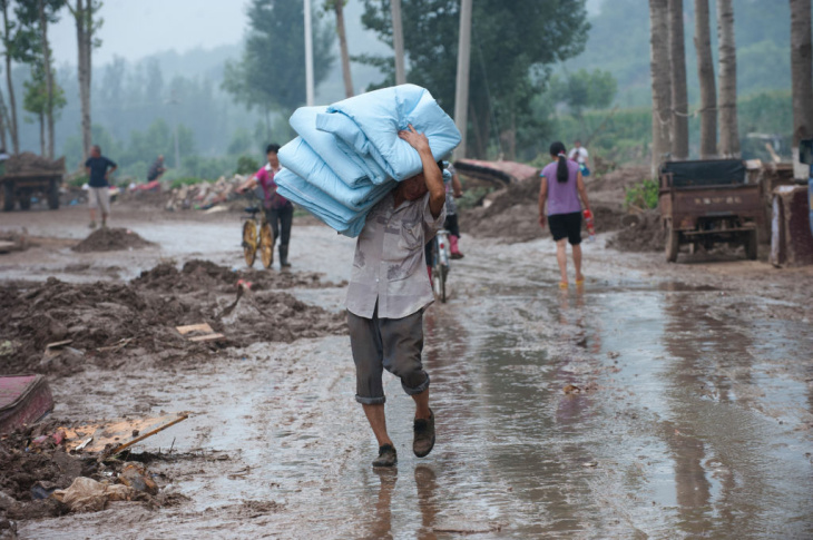 A man makes his way home with donated bl