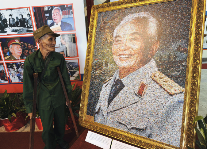 Xuan Hieu (L), 78, a Dien Bien Phu veter