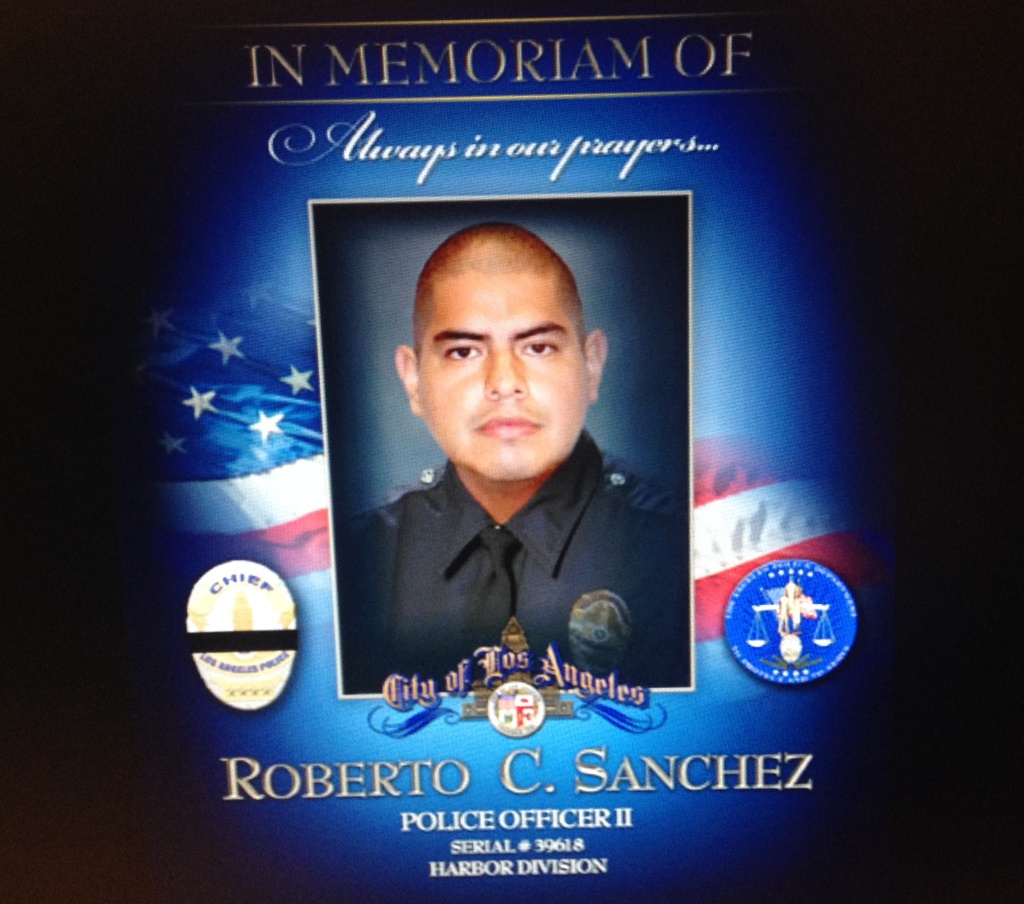 Officer Roberto Sanchez was killed May 3, 2014 in a Harbor City crash. While following a suspect in a car, an SUV broadsided the patrol car. Sanchez had six years service with the LAPD.