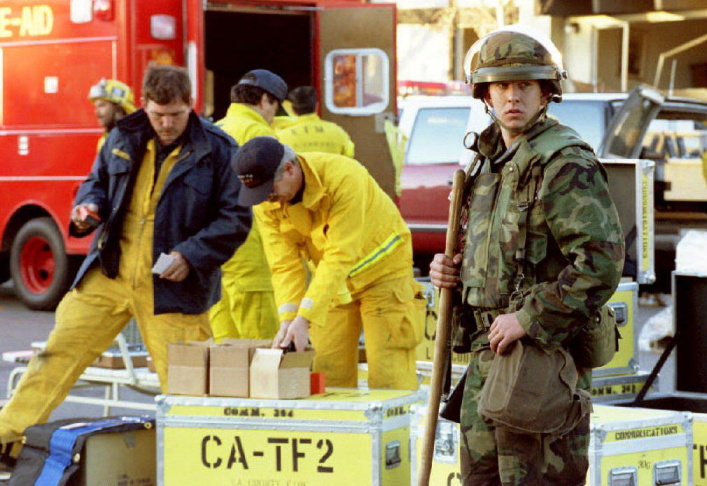 A California National Guard troop stands watch out