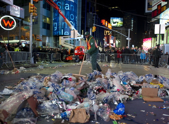 A sanitation worker cleans up Times Square after its New Year's Eve celebration.