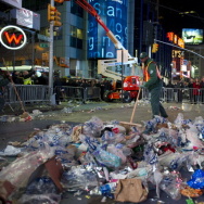 A sanitation worker cleans up Times Square after its New Year's Eve celebration.
